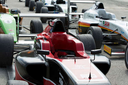 Imola, Italy - October 11, 2014: A Tatuus F.4 T014 Abarth of F & M S.R.L Racing team, driven By Raghunathan Mahaveer (Ind),  the Italian F4 Championship car racing on October 11, 2014 in Imola, Italy.のeditorial素材