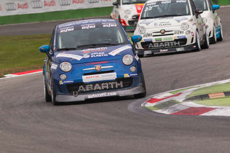 Monza, Italy - October 25, 2014: Fiat Abarth 695 of  C&C Racing  Team, driven by Campani Alex in action during the Abarth Italia & Europa Trophy - Race in Autodromo Nazionale di Monza Circuit on October 25, 2014 in Imola, Italyのeditorial素材