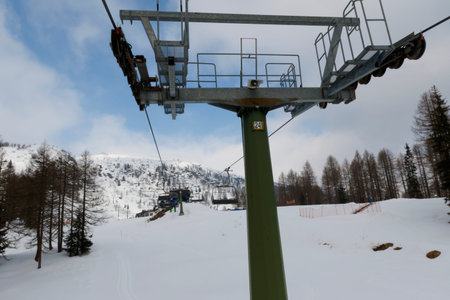 Falcade, Belluno, Italy - March 21, 2015: 4-seater chairlift Molino - Le Buse now removed in the Dolomite Alps ski area San Pellegrinoのeditorial素材