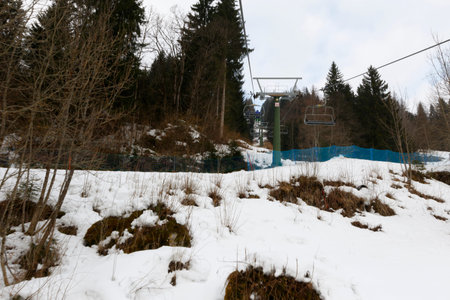 Falcade, Belluno, Italy - March 21, 2015: 4-seater chairlift Molino - Le Buse now removed in the Dolomite Alps ski area San Pellegrinoの写真素材