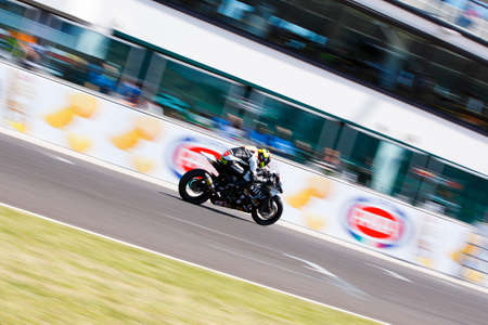 Misano Adriatico, Italy - June 21, 2015: Kawasaki ZX-10R of Clasitaly Team, driven by SANCHIONI Federico in action during the Superstock 1000 Race during the FIM Superstock 1000 - race at Misano World Circuit on June 21, 2015 in Misano Adriatico, Italy.のeditorial素材