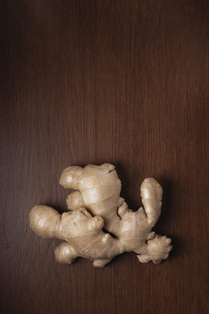 Ginger root on dark brown