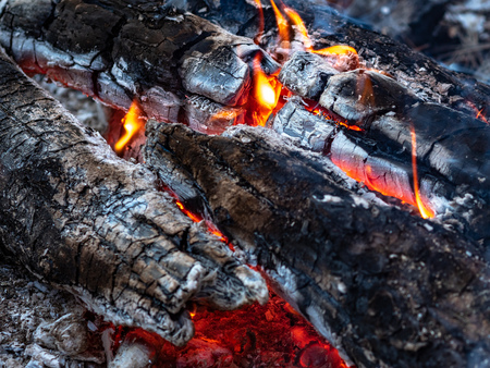Firewood, weakly burning in the fire, close-upの写真素材