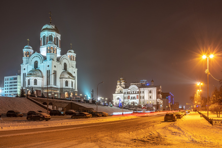 Urban Christian temple on a winter night, illuminated by spotlights. Copy space background. Temple-on-the-Blood, Yekaterinburg, Russiaの写真素材
