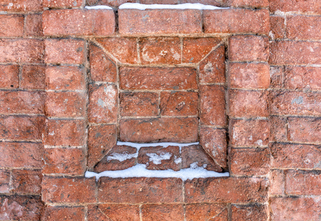 Fragment of a 19th century brick wall. Vintage bricks. Old wall.の写真素材