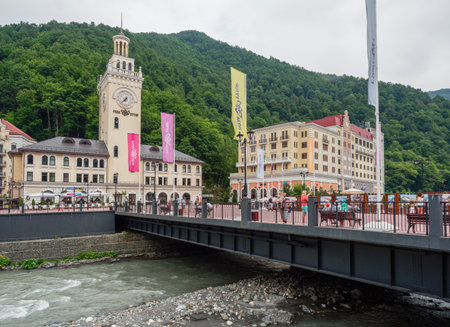 Sochi - Russian Feseration - July 17, 2017 - Town Hall building with a clock in the village of Rosa...