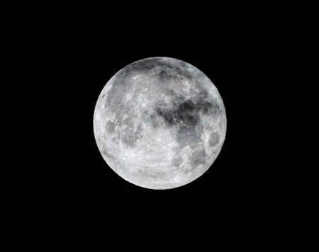 Detailed image of the full moon. Full moon against the black night sky.の写真素材