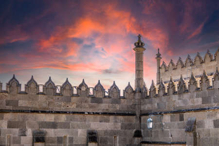 The walls of the old palace on the background of a pink sunset. Vorontsov Palace, or the Alupka Palace is a historic palace situated at the foot of the Crimean Mountains near town of Alupka, Crimea.のeditorial素材
