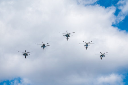 Moscow, Russia - May, 05, 2021: Mi-35M attack helicopters in the sky over Moscow during the parade dedicated to the anniversary of Victory in the Great Patriotic Warのeditorial素材