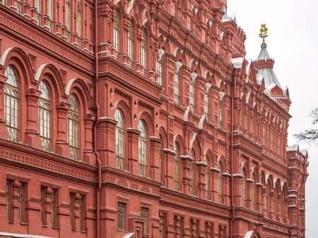 Fragment of the facade of an old building of the 19th century. State historical museum on the Red Square in Moscow, Russia. An old building of the 19th century with red brick towers, built in the years 1874-1883の写真素材
