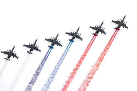 Moscow, Russia - May, 05, 2021: Six attack aircrafts Su-25 Frogfoot fly with smoke, painted in the...