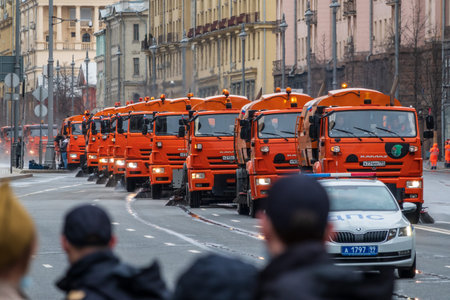 Moscow, Russia - May 5, 2021: A column of sweeper cars after the May 9 parade in Moscow. The street...