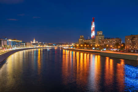 View on the Moscow river, Berezhkovskaya and Savvinskaya embankments in the evening, summer urban cityscape. Panorama of evening Moscow with view of Moscow river, Russiaの写真素材