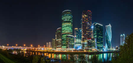 Moscow city at night. Modern skyscrapers in Moscow-city downtown, Federation tower, Mercury tower etc. Moscow, Russia - urban backgroundの写真素材