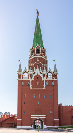 Moscow, Russia - May, 11, 2021: Troitskaya tower of Moscow Kremlin on a blue sky background in sunny summer day. The Trinity or Troitskaya Towerのeditorial素材