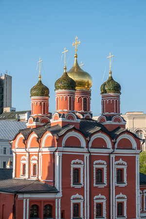 Domes of Church of St George the Victorious or Church of the Holy Great Martyr George on Pskov Mount on Varvarka street in Moscow and blue sky on background. Tour to Russia. Religious tourismの写真素材