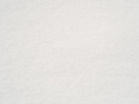 Background from snow shined with the sun. white snow textureの写真素材