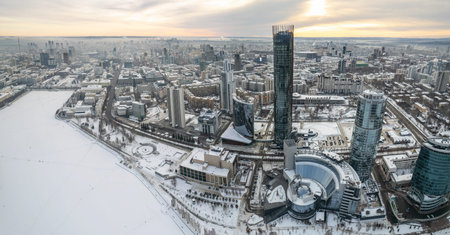 Yekaterinburg aerial panoramic view in Winter at sunset. Yekaterinburg city and pond in winter. Yekaterinburg, Russiaの写真素材