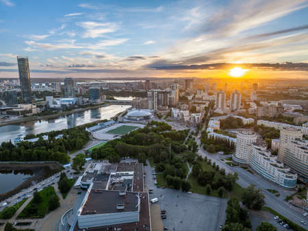 Yekaterinburg city and pond aerial panoramic view at summer sunset. Yekaterinburg, Russiaの写真素材