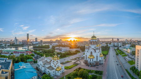 Summer Yekaterinburg, Temple on Blood and Church of St. Nicholas in cloudy sunset. Aerial view of Yekaterinburg, Russia. Translation of text on the temple: Honest to the Lord is the death of His saintsの写真素材