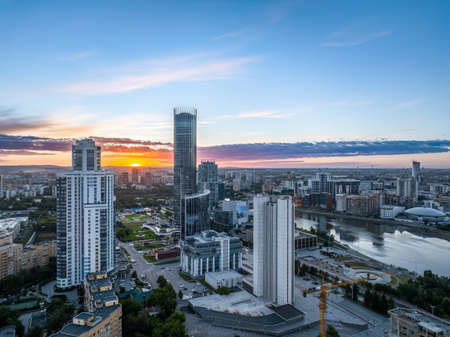 Yekaterinburg city and pond aerial panoramic view at summer sunset. Yekaterinburg, Russiaの写真素材