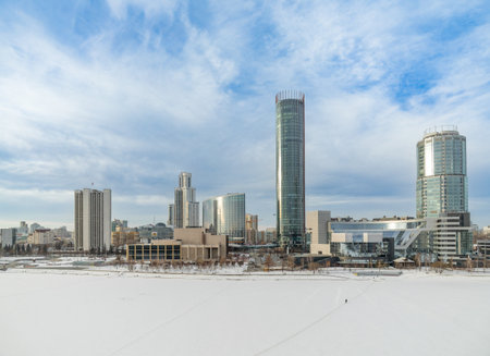 Yekaterinburg city with Buildings of Regional Government and Parliament, Dramatic Theatre, Iset Tower, Yeltsin Center, panoramic view at winter sunset. Translate: Yeltsin Center. Yekaterinburg, Russiaの写真素材