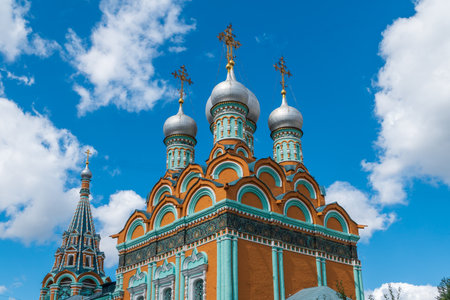 Church of Saint Gregory of Neocaesarea in Polyanka, Bright red green sanctuary in the city center. Old historical building built in 1668. Moscow, Russiaの写真素材