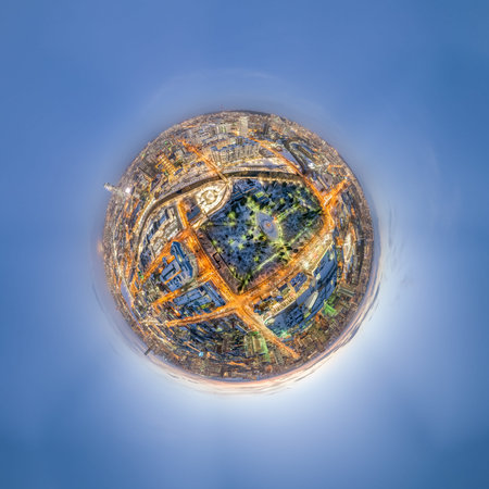 Aerial winter city view with crossroads and roads, houses, buildings, parks and bridges. Copter...