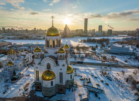 Winter Yekaterinburg and Temple on Blood in beautiful blue clear sunset. Aerial view. Yekaterinburg, Russia. Translation of the text on the temple: Honest to the Lord is death of His saints.の写真素材