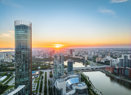 Yekaterinburg city and pond aerial panoramic view at summer sunset. Yekaterinburg, Russiaの写真素材