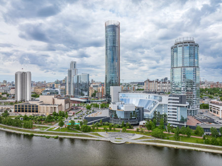 Yekaterinburg city with Buildings of Regional Government and Parliament, Dramatic Theatre, Iset Tower, Yeltsin Center, panoramic view at summer sunset. Yekaterinburg, Russiaの写真素材