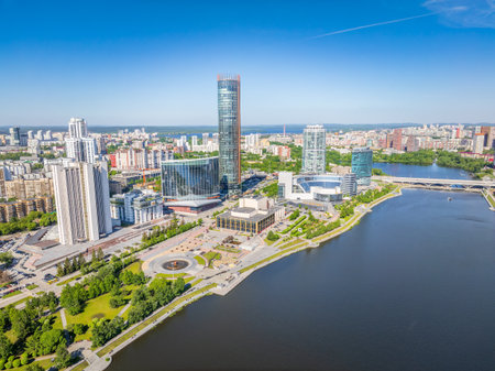 Yekaterinburg city with Buildings of Regional Government and Parliament, Dramatic Theatre, Iset Tower, Yeltsin Center, panoramic view at summer sunset. Yekaterinburg, Russiaの写真素材