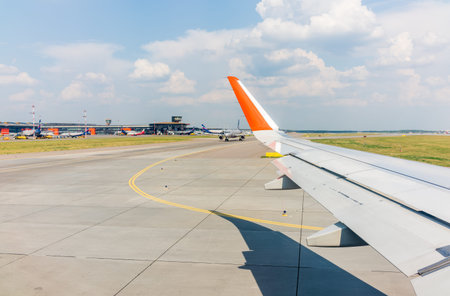 View from the airplane window during takeoff at Sheremetyevo airport at summer. Moscow, Russia