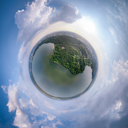 Big lake system in bright sun light, aerial landscape. Recreation concept. Sky reflection. Ecology in Europe. Aerial view. Little planet sphere mode.の写真素材