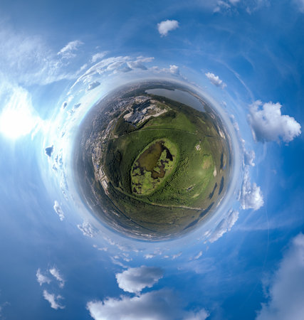 Big lake system in bright sun light, aerial landscape. Recreation concept. Sky reflection. Ecology. Aerial view. Little planet sphere mode.の写真素材