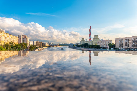 View of Berezhkovskaya Embankment in Moscow with reflection on a mirror stone surface. Moscow, Russiaの写真素材