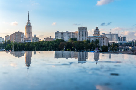 View of Berezhkovskaya Embankment in Moscow with reflection on a mirror stone surface. Moscow, Russiaの写真素材