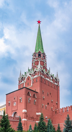 Troitskaya tower of Moscow Kremlin on a blue sky background in sunny summer day. The Trinity or Troitskaya Towerの写真素材