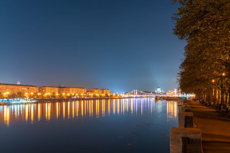 Krymsky Bridge or Crimean Bridge in Moscow at summer night. Steel suspension bridge in Moscow over the Moskva Riverの写真素材