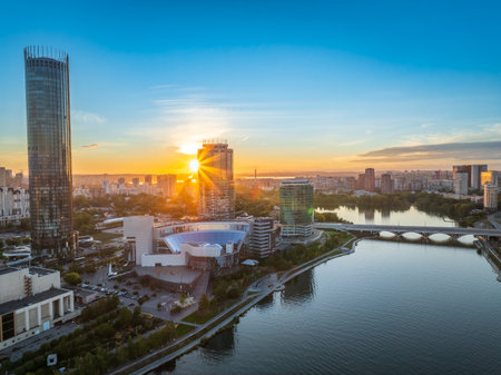 Yekaterinburg city and pond aerial panoramic view at summer or early autumn sunset. Night city in the early autumn. Yekaterinburg, Russia. Aerial view.の写真素材