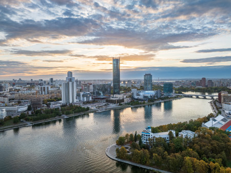 Yekaterinburg city and pond aerial panoramic view at summer or early autumn sunset. Night city in the early autumn. Yekaterinburg, Russia. Aerial view.の写真素材