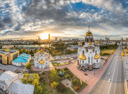 Autumn Yekaterinburg and Temple on Blood in in beautiful clear sunset. Aerial view. Yekaterinburg, Russia. Translation of the text on the temple: Honest to the Lord is death of His saints.の写真素材