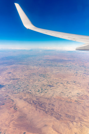 Aerial view on Arabian desert and Red sea mountains from airplane. View from the airplane desert mountainsの写真素材