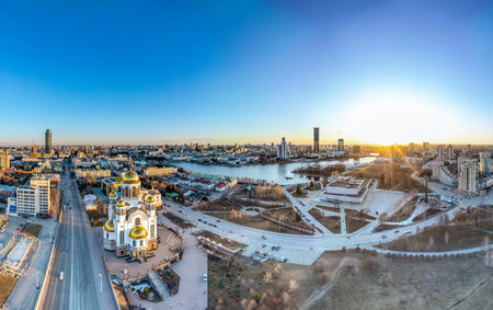 Early spring or autumn Yekaterinburg and Temple on Blood in clear sunset. Aerial view. Yekaterinburg, Russia. Translation of the text on the temple: Honest to the Lord is death of His saints.の写真素材
