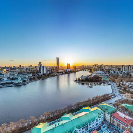 Yekaterinburg aerial panoramic view in spring at sunset. Yekaterinburg city and pond in spring or autumn. Yekaterinburg, Russiaの写真素材