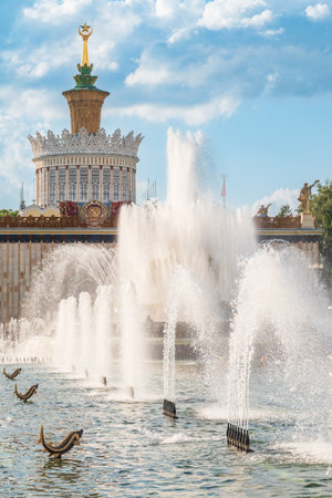 Stone Flower fountain and pavilion Ukraine in Exhibition of economic achievements, VDNKh, Moscow, Russia. Splashes of water against light background.の写真素材