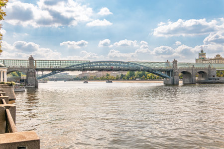 View of the Moscow river embankment, Pushkinsky bridge and cruise ships at sunset. Wide Moskva River, Pushkinsky bridge, Groky Park, Frunzenskaya embankment,の写真素材