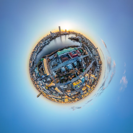 Yekaterinburg city with Buildings of Regional Government and Parliament, Dramatic Theatre, Iset Tower, Yeltsin Center, Aerial summer View. Little planet sphere mode. Evening city in the summer sunsetの写真素材