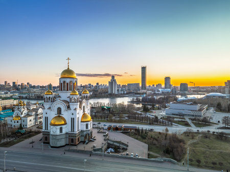 Early spring or autumn Yekaterinburg and Temple on Blood in clear sunset. Aerial view. Yekaterinburg, Russia. Translation of the text on the temple: Honest to the Lord is death of His saints.の写真素材