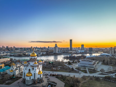 Early spring or autumn Yekaterinburg and Temple on Blood in clear sunset. Aerial view. Yekaterinburg, Russia. Translation of the text on the temple: Honest to the Lord is death of His saints.の写真素材